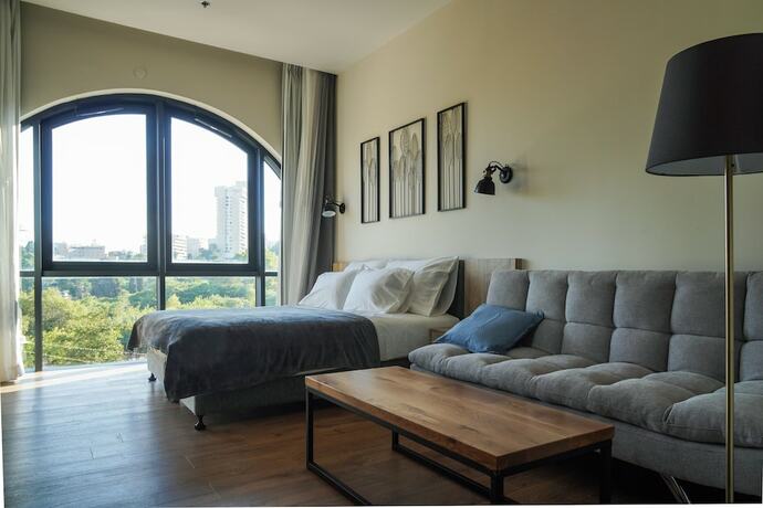 Imagen de la habitación del Apartique Hotel. Foto 17