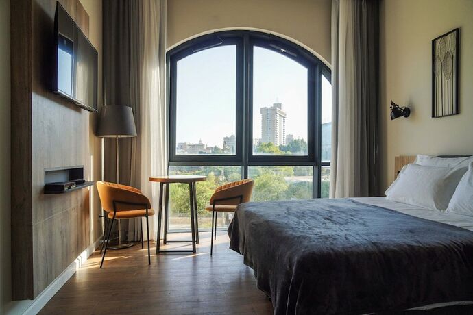 Imagen de la habitación del Apartique Hotel. Foto 18