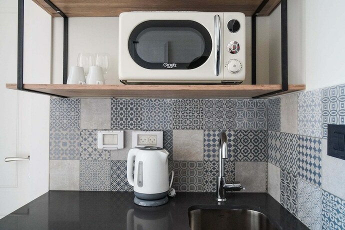 Imagen de la habitación del Apartique Hotel. Foto 20