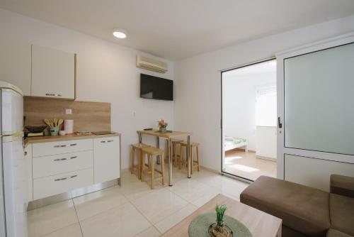 Imagen de la habitación del Apartmani SASKUR. Foto 13