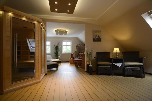 Imagen de los interiores del Apartment Hotel R&uuml;ther. Foto 16