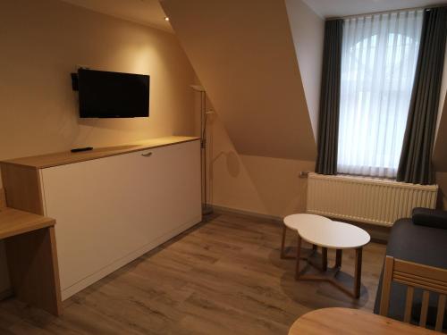 Imagen de la habitación del Apartment Hotel R&uuml;ther. Foto 10