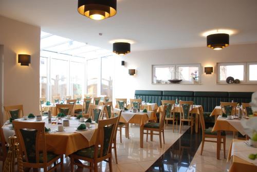 Imagen del bar/restaurante del Apartment Hotel R&uuml;ther. Foto 4