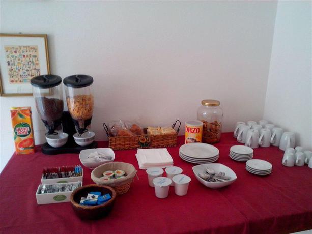 Imagen del bar/restaurante del Apartment Nido Stazione. Foto 3