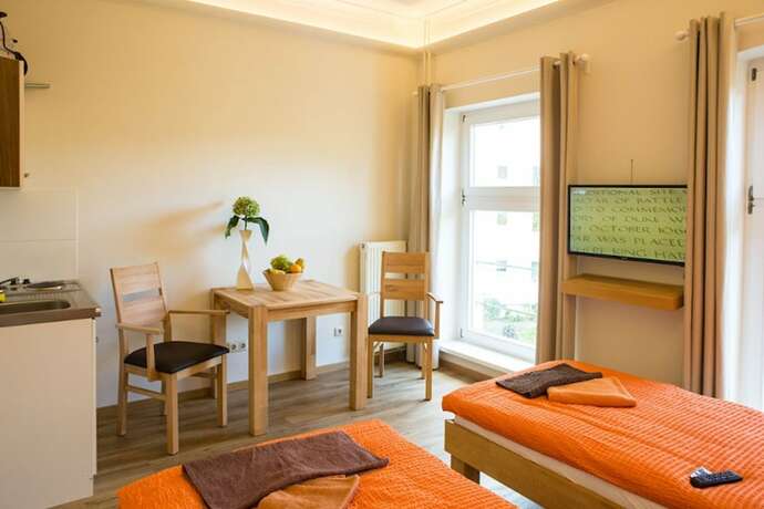 Imagen de la habitación del Apartmentpension Am Stadtschloss. Foto 25