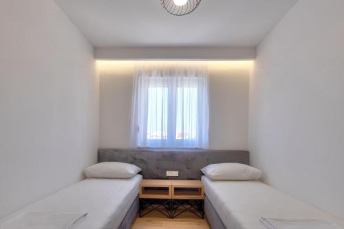 Imagen de la habitación del Apartments Amare. Foto 17