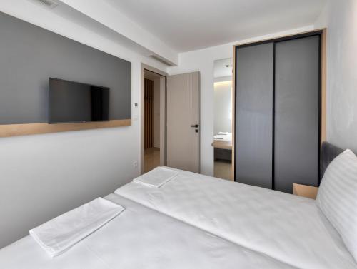 Imagen de la habitación del Apartments Amare. Foto 20