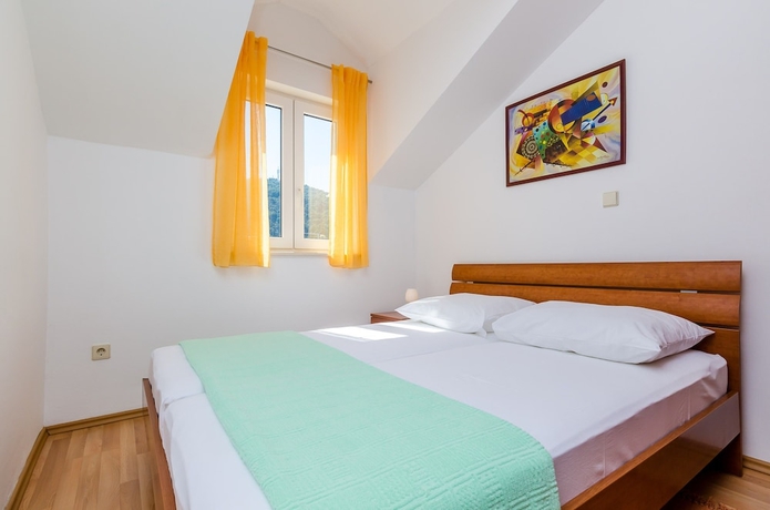 Imagen de la habitación del Apartments Villa Perla. Foto 6