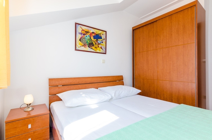 Imagen de la habitación del Apartments Villa Perla. Foto 7
