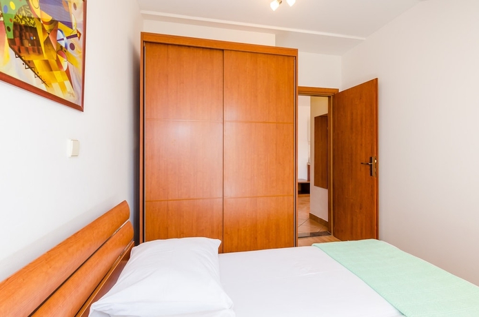Imagen de la habitación del Apartments Villa Perla. Foto 8