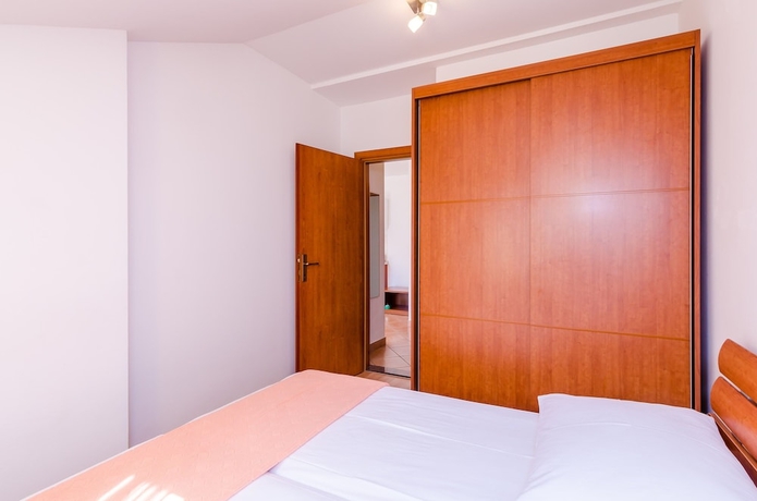 Imagen de la habitación del Apartments Villa Perla. Foto 10