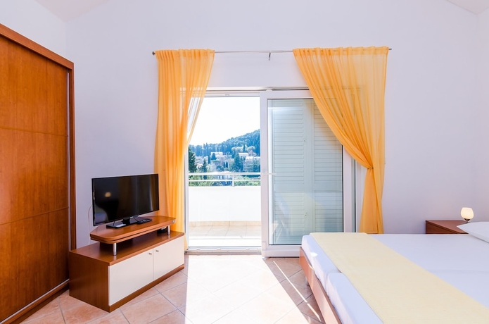 Imagen de la habitación del Apartments Villa Perla. Foto 11