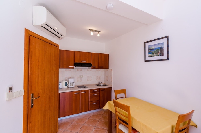 Imagen de la habitación del Apartments Villa Perla. Foto 16