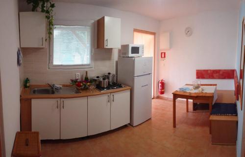 Imagen general del Apartments Villaggio Riccio. Foto 6
