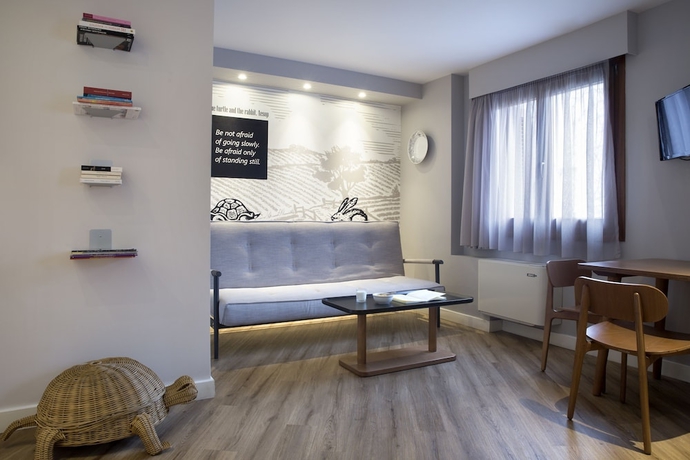 Imagen de la habitación del Apollon Library Suites. Foto 9