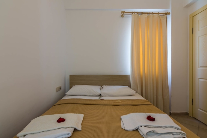 Imagen de la habitación del Apollonium Spa and Beach Resort. Foto 2