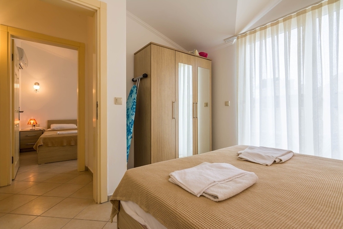 Imagen de la habitación del Apollonium Spa and Beach Resort. Foto 3
