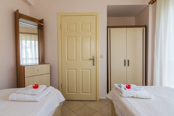 Imagen de la habitación del Apollonium Spa and Beach Resort. Foto 4