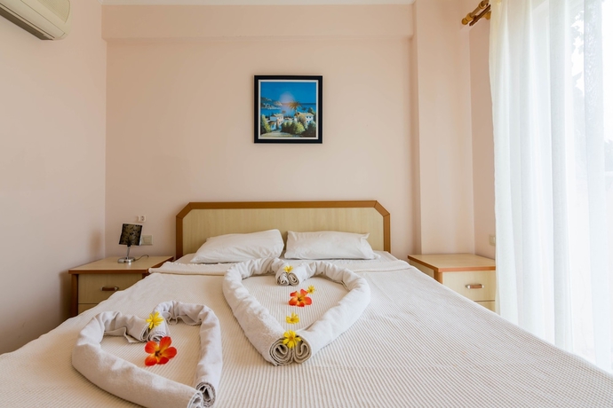 Imagen de la habitación del Apollonium Spa and Beach Resort. Foto 5
