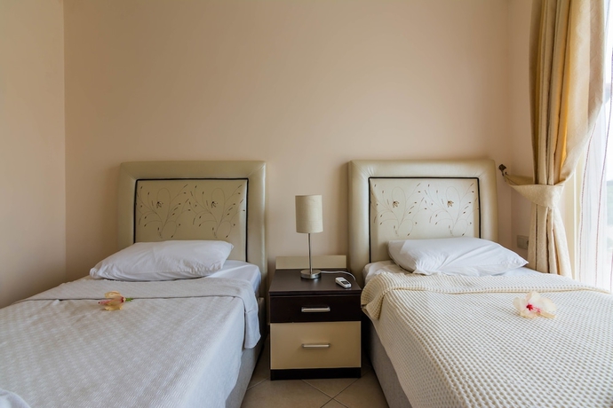 Imagen de la habitación del Apollonium Spa and Beach Resort. Foto 8
