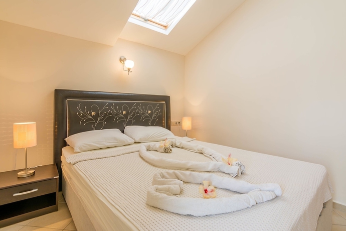 Imagen de la habitación del Apollonium Spa and Beach Resort. Foto 9