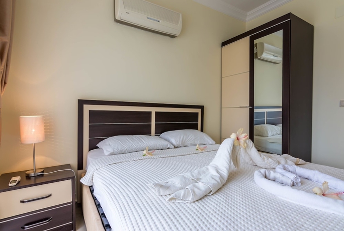 Imagen de la habitación del Apollonium Spa and Beach Resort. Foto 10