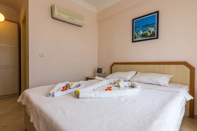 Imagen de la habitación del Apollonium Spa and Beach Resort. Foto 14