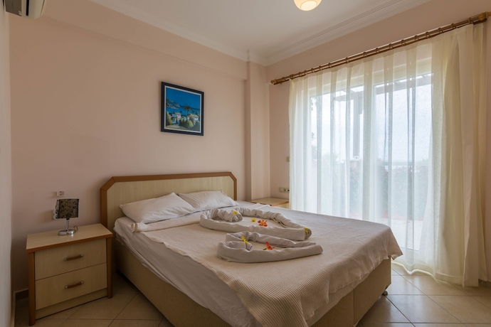Imagen de la habitación del Apollonium Spa and Beach Resort. Foto 15