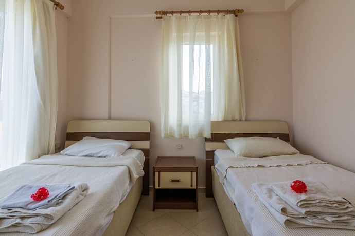 Imagen de la habitación del Apollonium Spa and Beach Resort. Foto 16