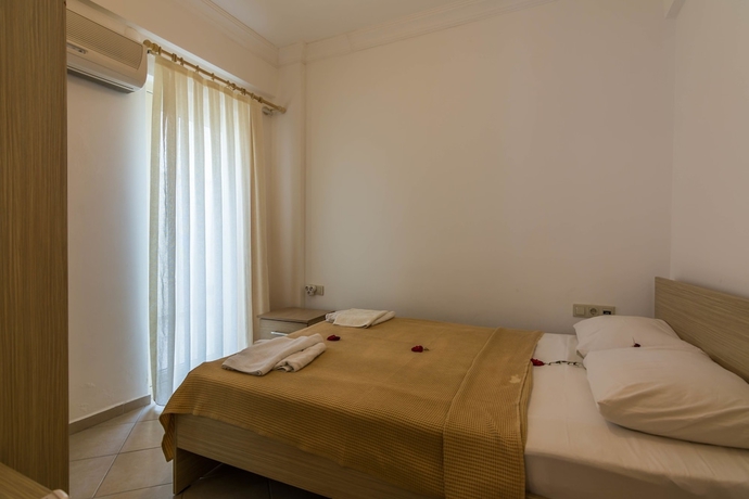 Imagen de la habitación del Apollonium Spa and Beach Resort. Foto 18