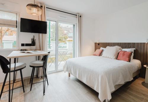 Imagen de la habitación del Appart Hotel Neostelia. Foto 16