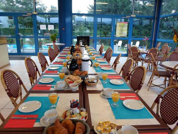 Imagen del bar/restaurante del Appart\'Hotel Les Acacias. Foto 3