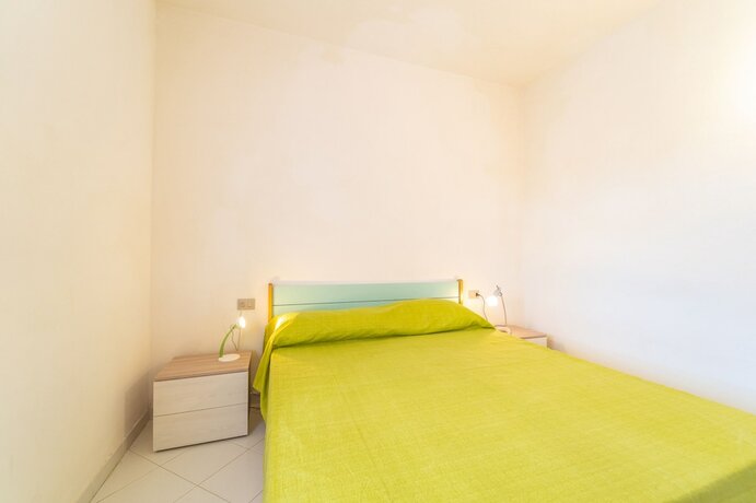 Imagen de la habitación del Appartamenti Ambra a San Teodoro. Foto 19