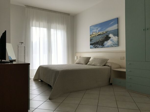 Imagen de la habitación del Appartamenti Aquamarina. Foto 13