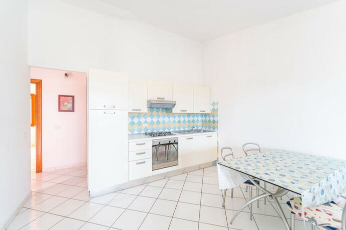 Imagen de la habitación del Appartamenti Citai a San Teodoro. Foto 17