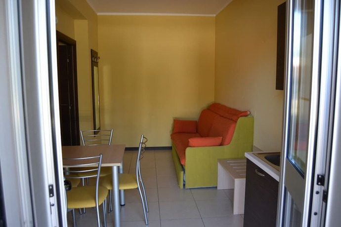 Imagen de la habitación del Appartamenti La Marina. Foto 14