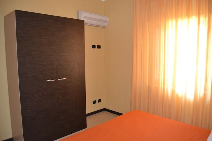 Imagen de la habitación del Appartamenti La Marina. Foto 15