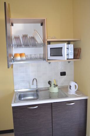 Imagen de la habitación del Appartamenti La Marina. Foto 17