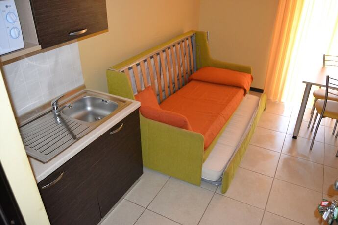 Imagen de la habitación del Appartamenti La Marina. Foto 18