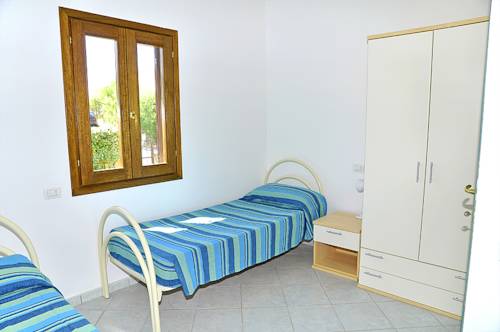 Imagen de la habitación del Appartamenti Tanaunella. Foto 4