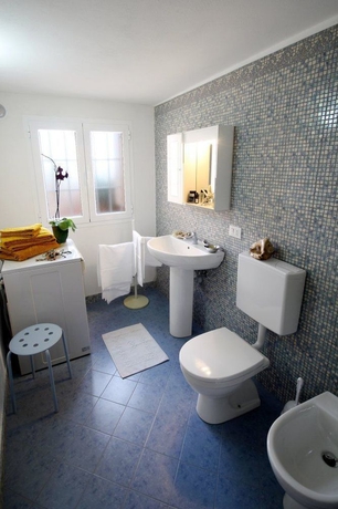 Imagen de la habitación del Appartamenti Villa Chiara. Foto 7