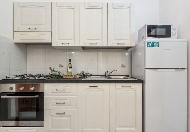 Imagen de la habitación del Appartamenti con A.C a San Teodoro. Foto 3