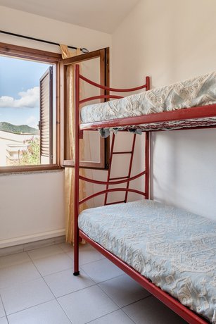 Imagen de la habitación del Appartamenti con A.C a San Teodoro. Foto 5