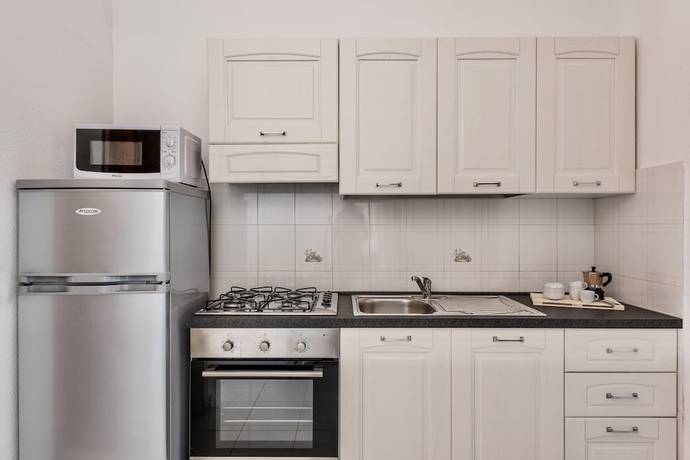 Imagen de la habitación del Appartamenti con A.C a San Teodoro. Foto 8