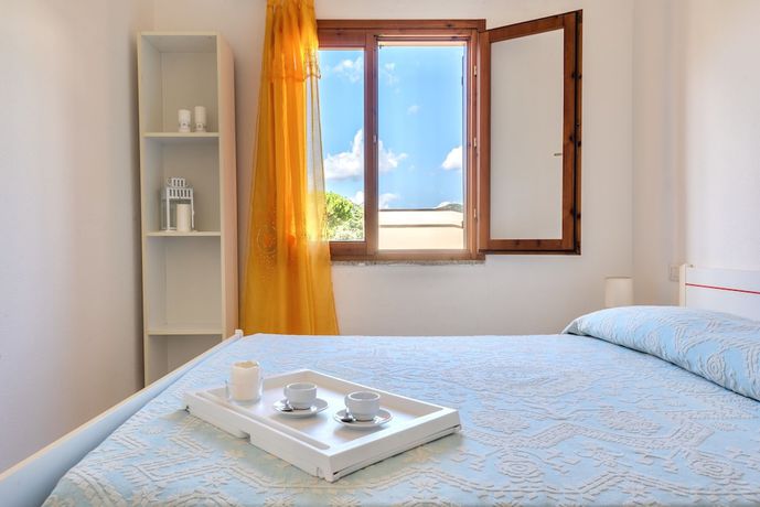 Imagen de la habitación del Appartamenti con A.C a San Teodoro. Foto 10