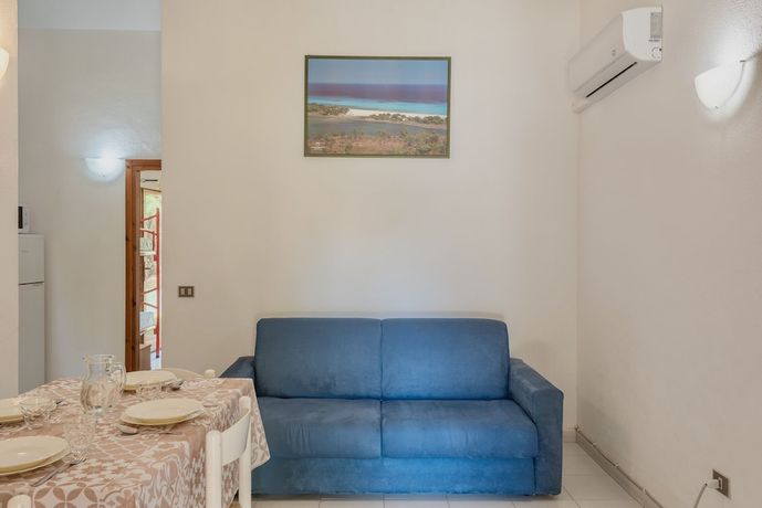 Imagen de la habitación del Appartamenti con A.C a San Teodoro. Foto 12