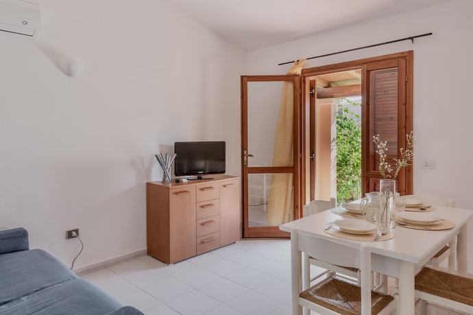 Imagen de la habitación del Appartamenti con A.C a San Teodoro. Foto 16