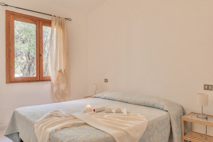 Imagen de la habitación del Appartamenti con A.C a San Teodoro. Foto 19