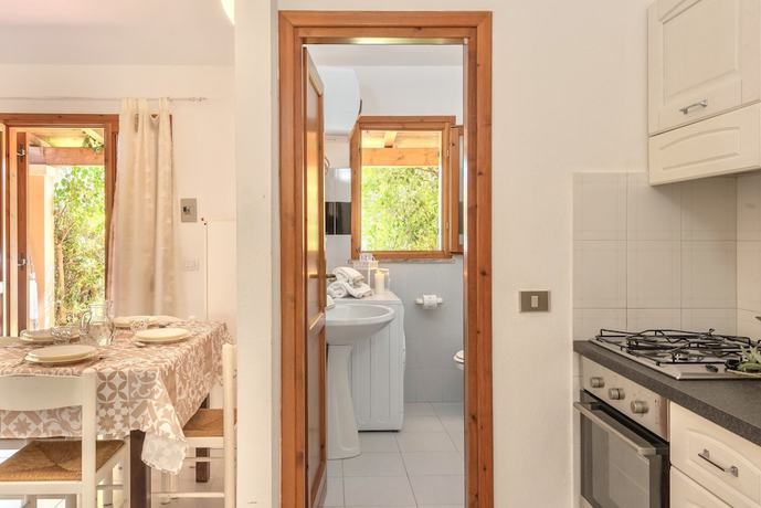 Imagen de la habitación del Appartamenti con A.C a San Teodoro. Foto 20