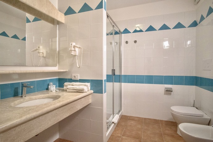 Imagen de la habitación del Appartamenti con WIFI e A.C a Orosei. Foto 6